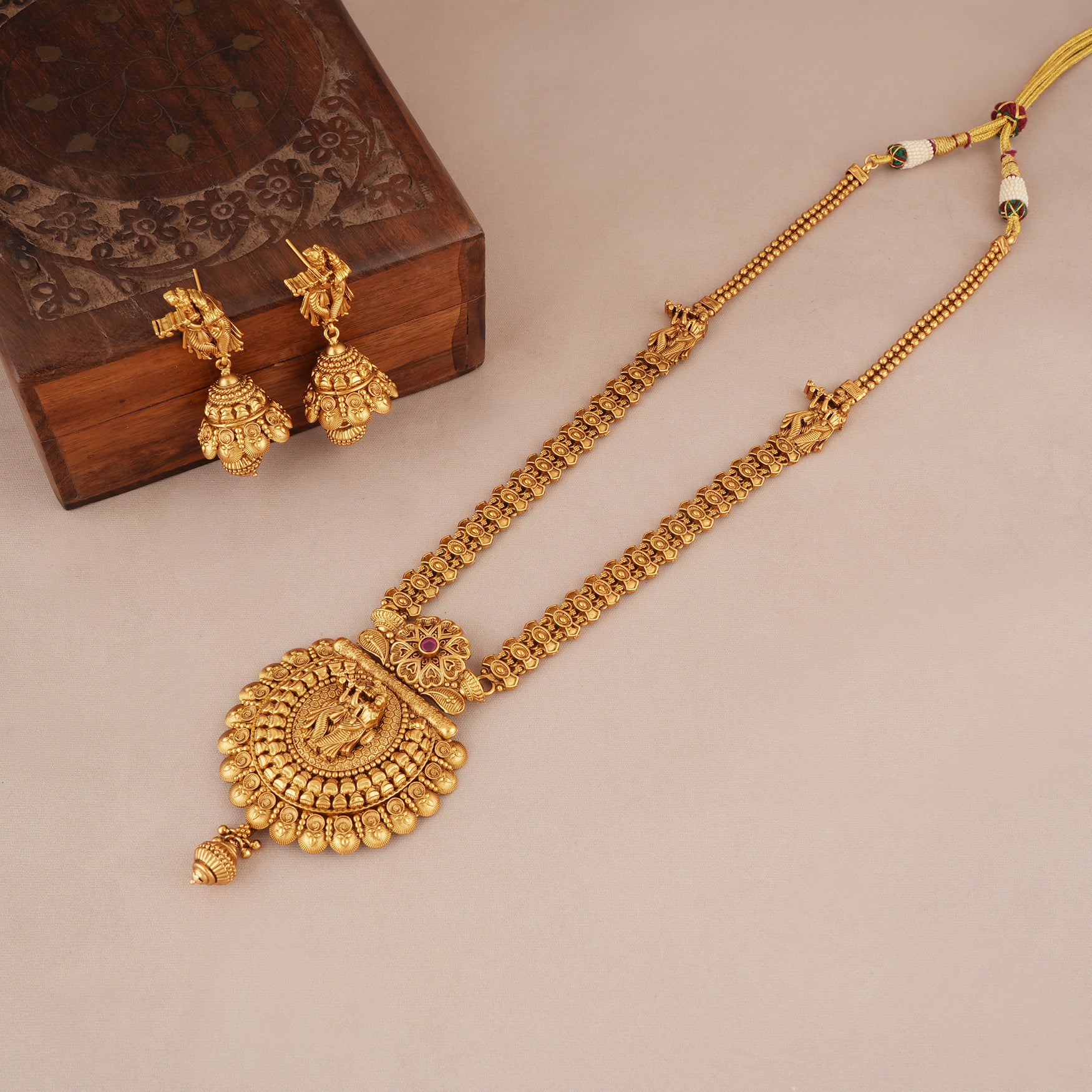 Long antique gold plated radha krishna necklace set with jhumka earring
