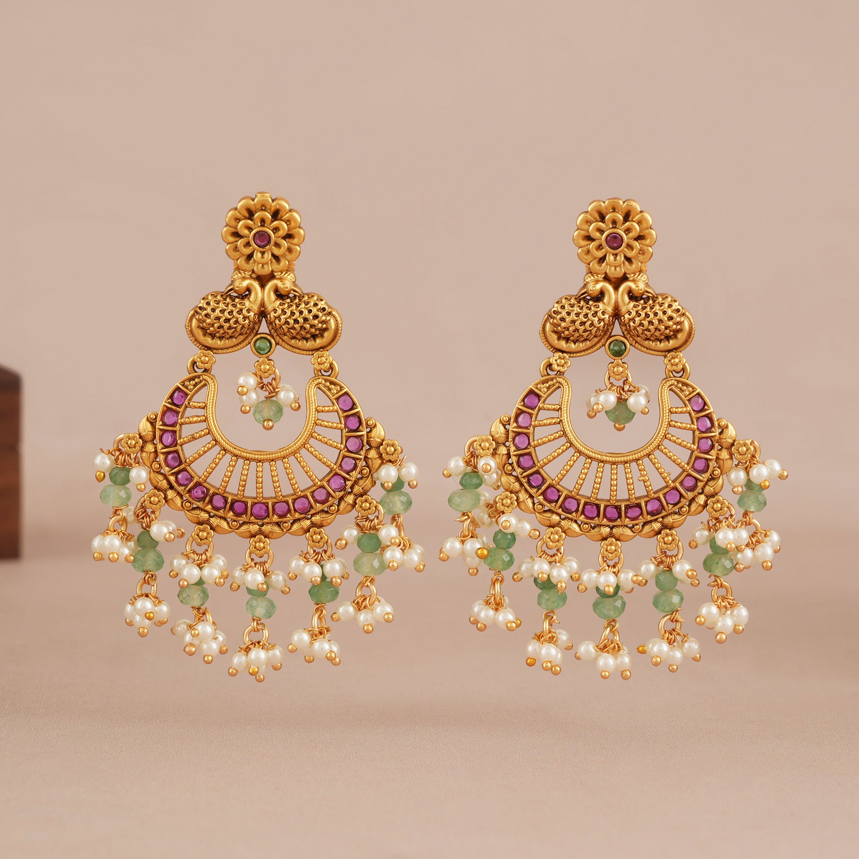 Long antique gold green stone dangler earring