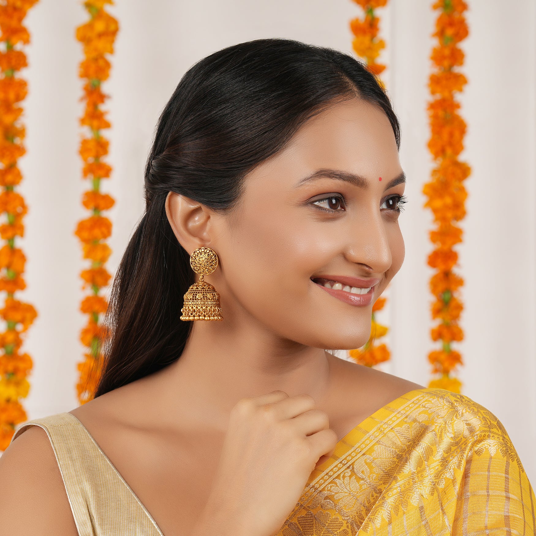 Stunning plain antique gold floral jhumka earring