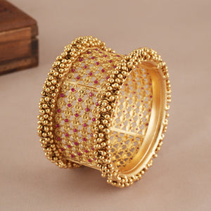 Stunning broad antique gold ruby kada bangle