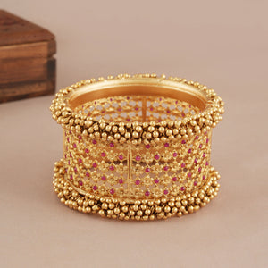 Stunning broad antique gold ruby kada bangle