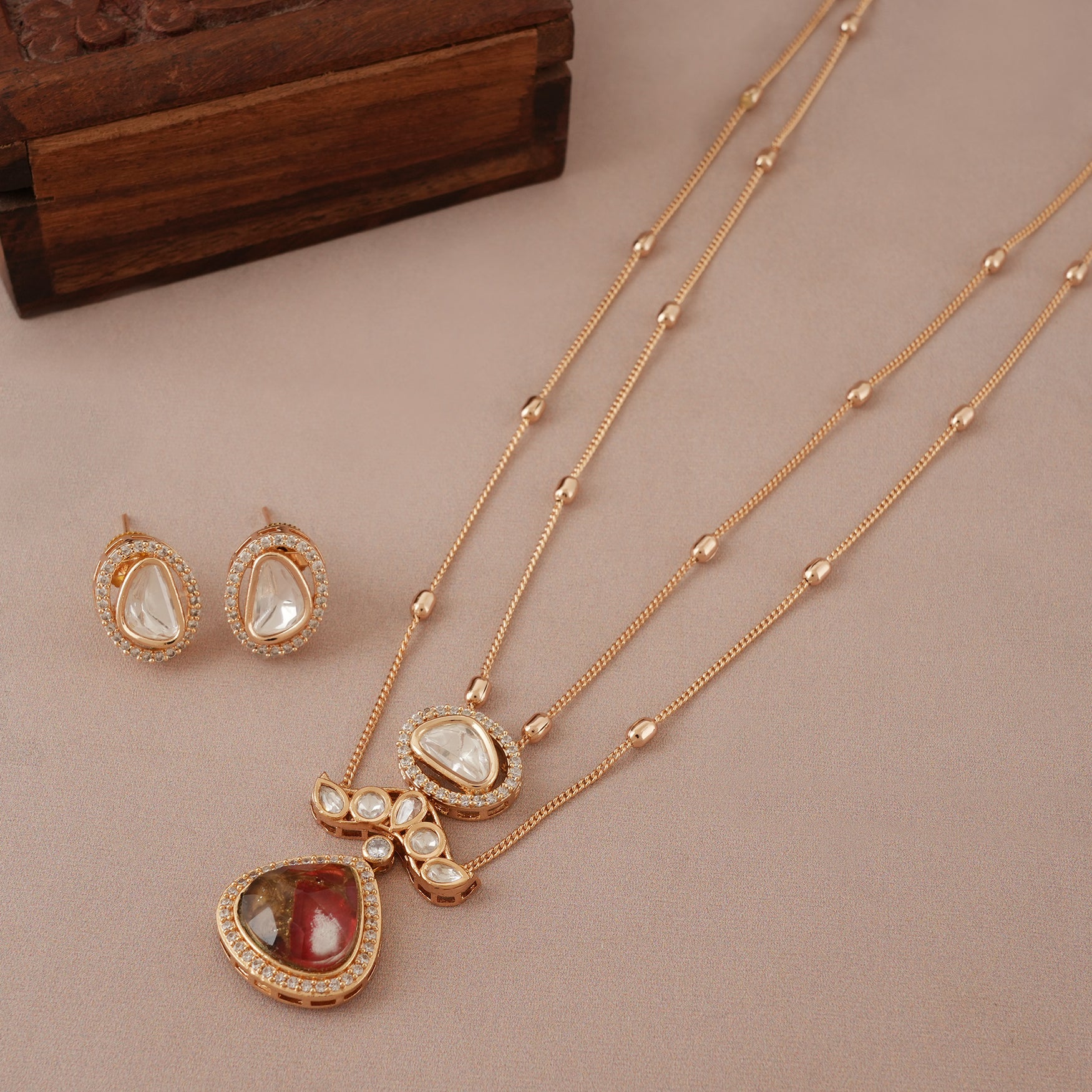 Stunning gold plated kundan ruby pendant set
