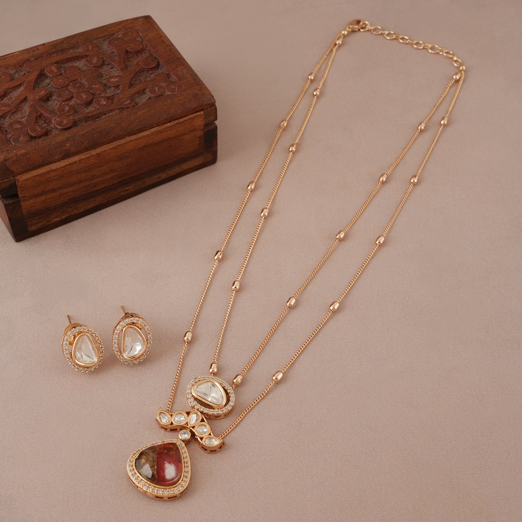 Stunning gold plated kundan ruby pendant set