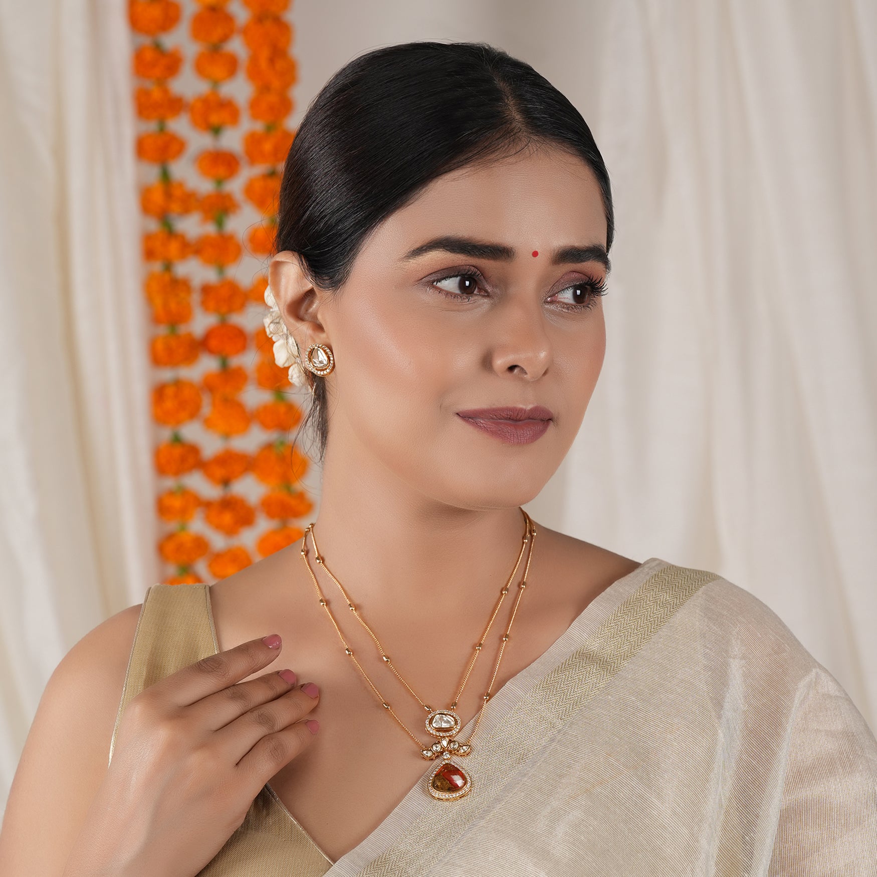 Stunning gold plated kundan ruby pendant set