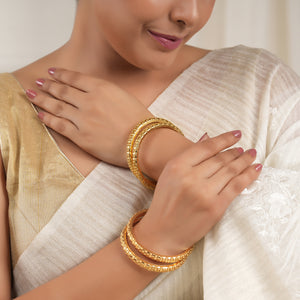 Beautiful antique gold plated bangle set for women ( set of 4 )