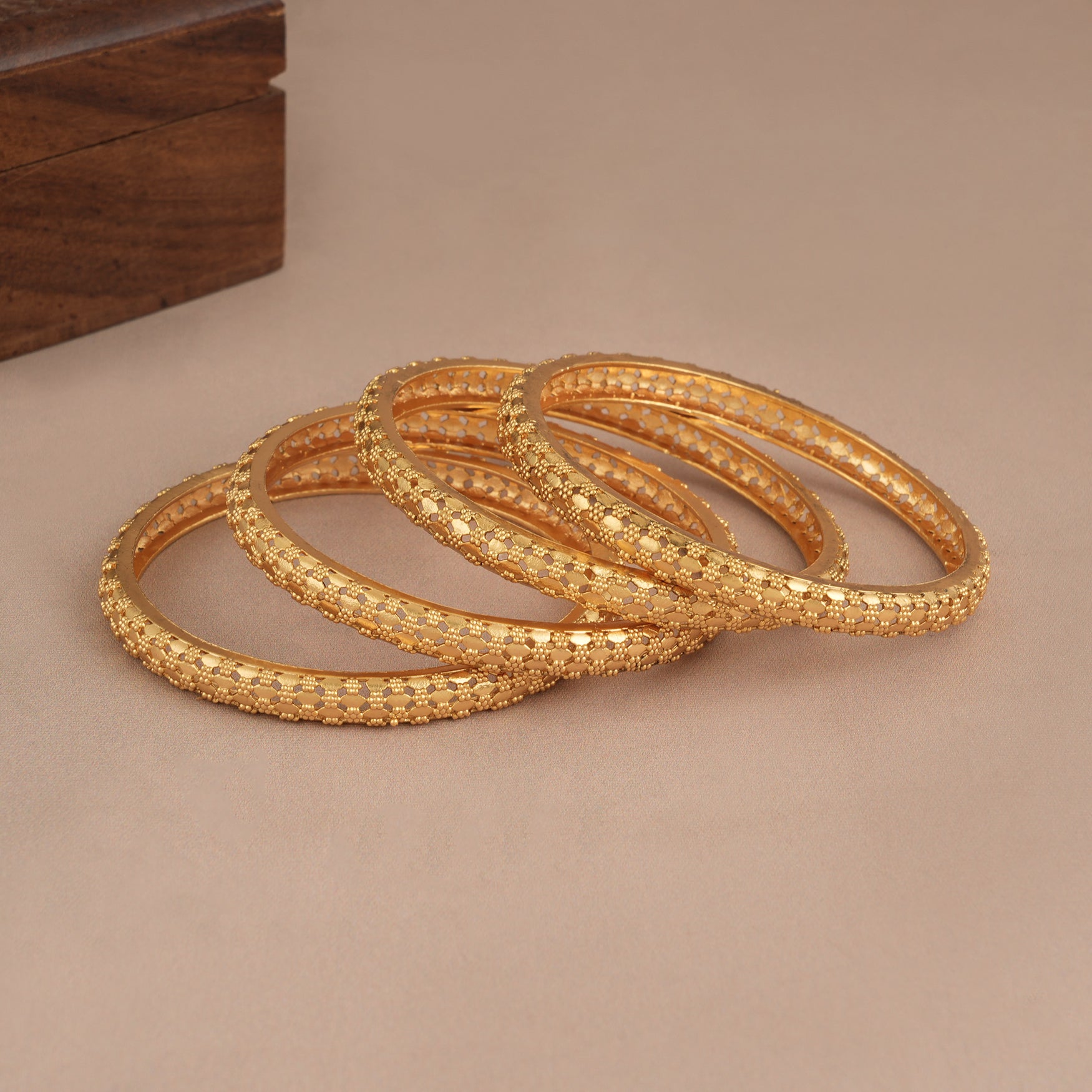 Beautiful antique gold plated bangle set for women ( set of 4 )