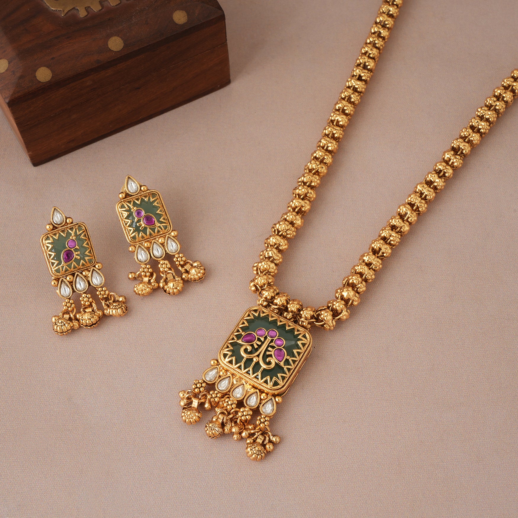 Stunning long antique gold emerald kundan pendant set smarsjewelrys