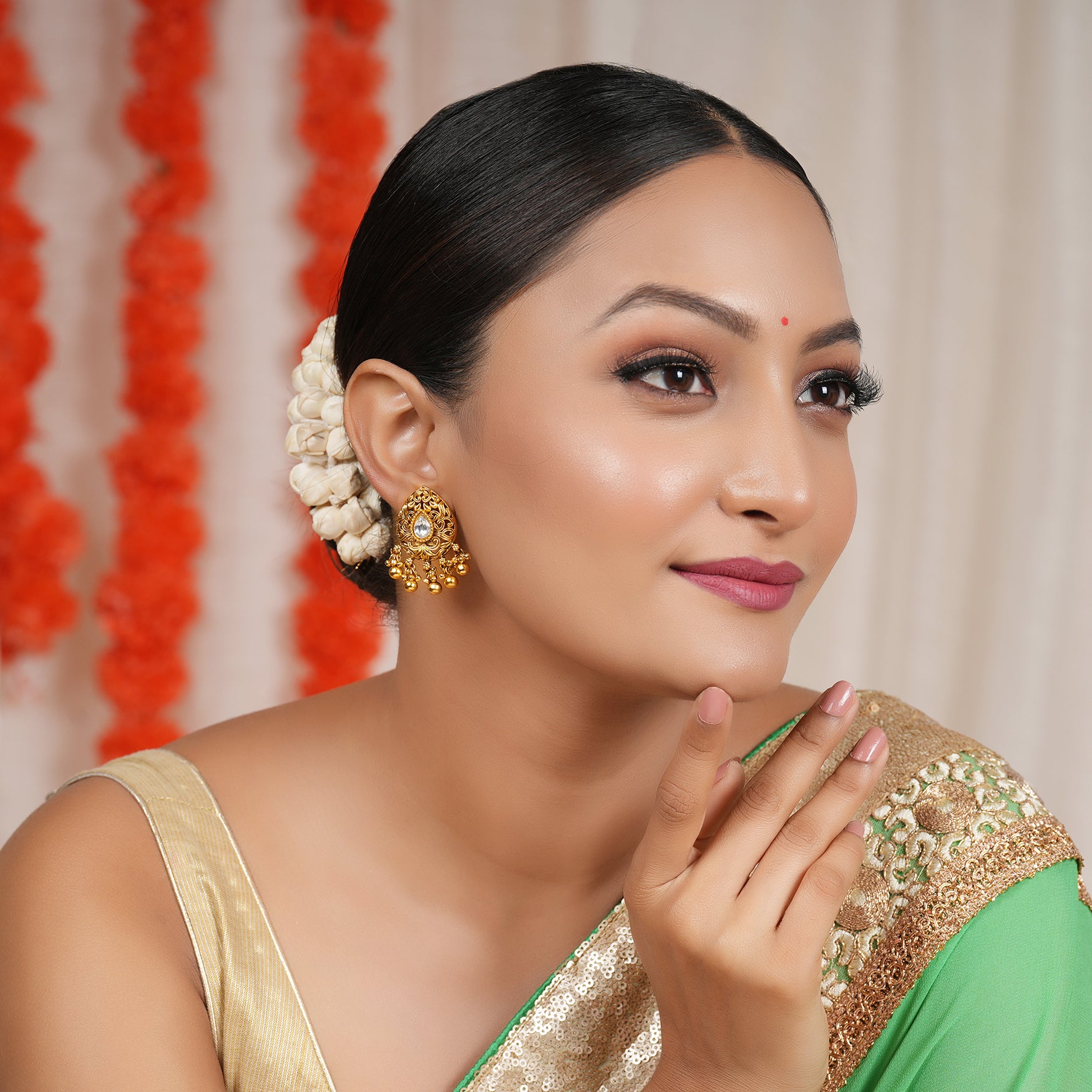 Stunning carved antique gold kundan dangler earring