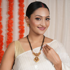 Beautiful antique gold stone ma lakshmi mangalsutra set with earring