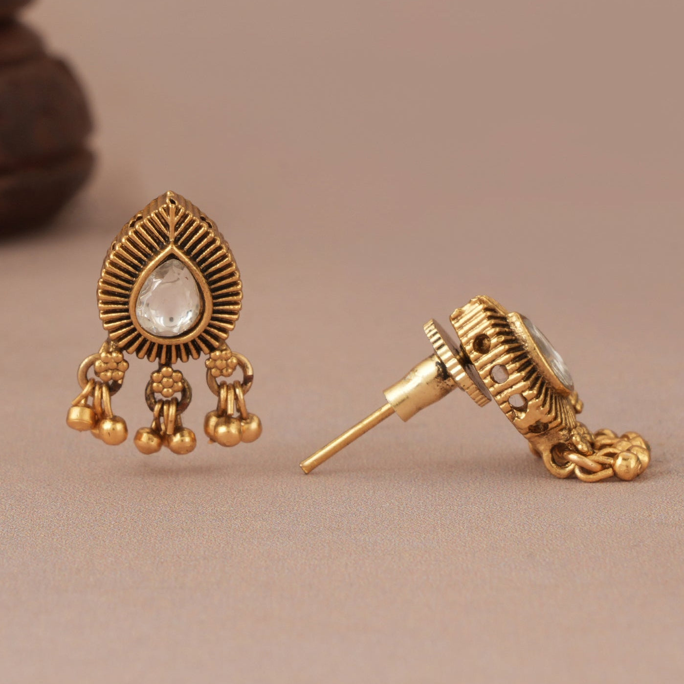 Cute kundan stone antique gold pear shape earring