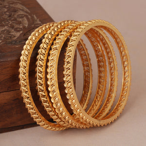 Beautiful sleek leaf antique gold bangle set ( set of 4 )