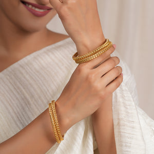 Beautiful sleek leaf antique gold bangle set ( set of 4 )