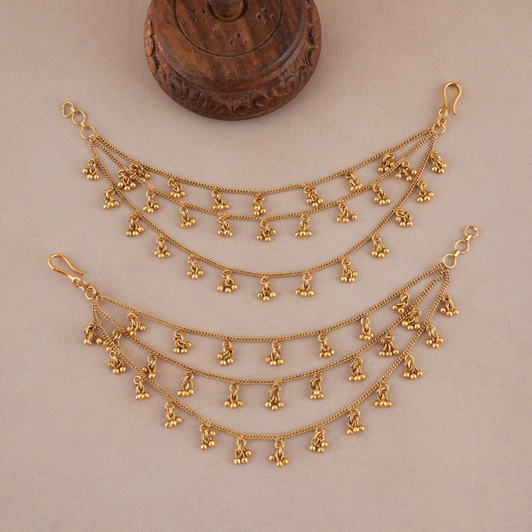 Elegant ball gold plated three line ear chain