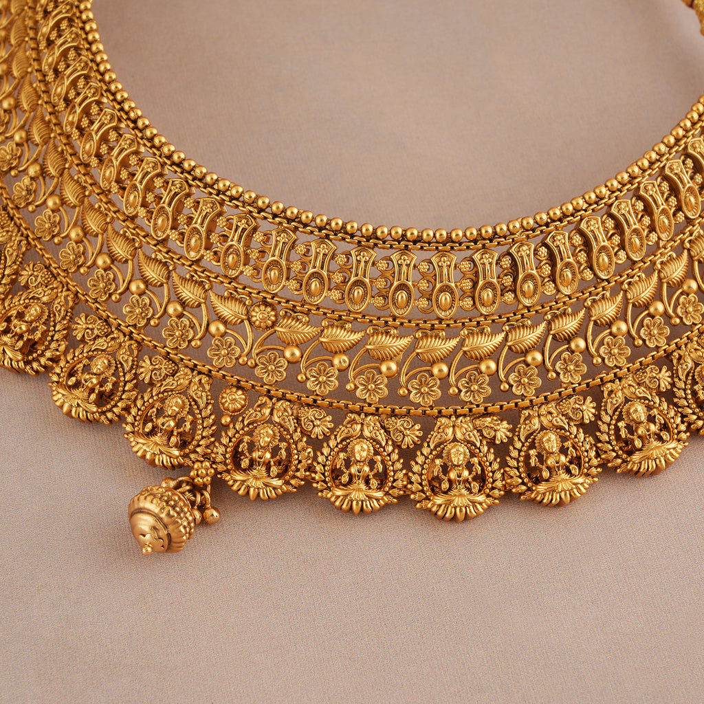 Auspicious antique gold plain intricate maa lakshmi choker necklace set