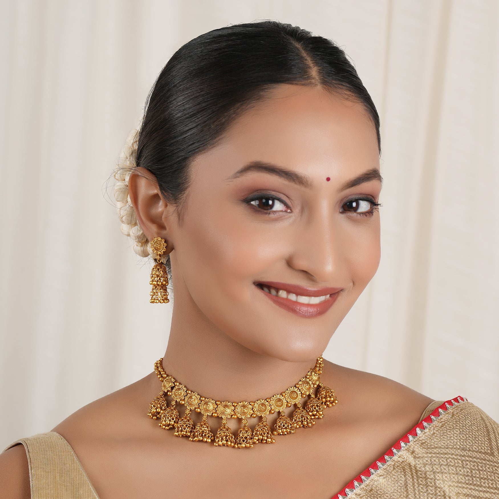 Stunning antique gold plain jhumka necklace set