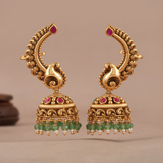 Stunning stone drop antique gold jhumka earring