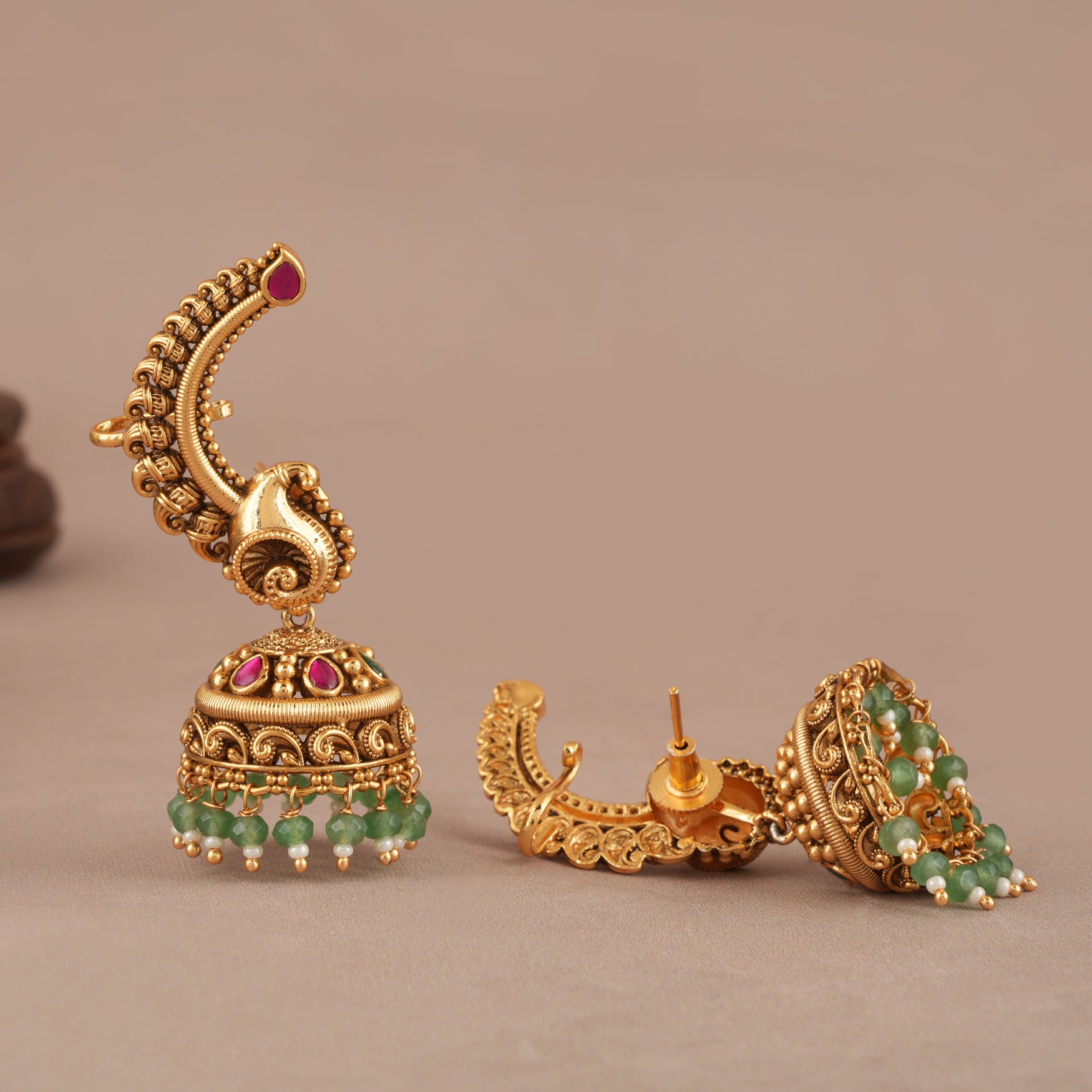 Stunning stone drop antique gold jhumka earring
