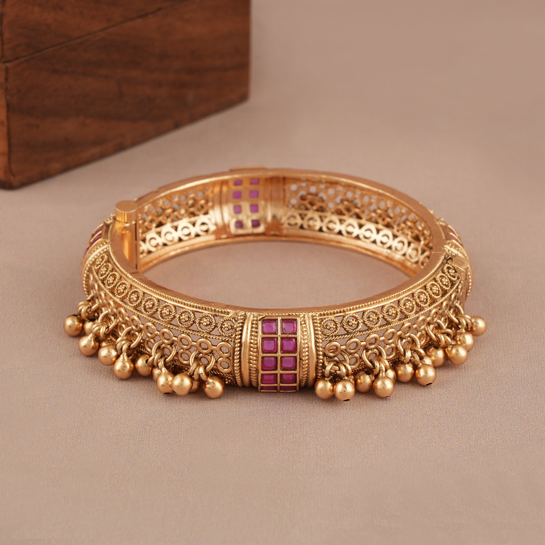 Broad antique gold ruby stone kada bangle
