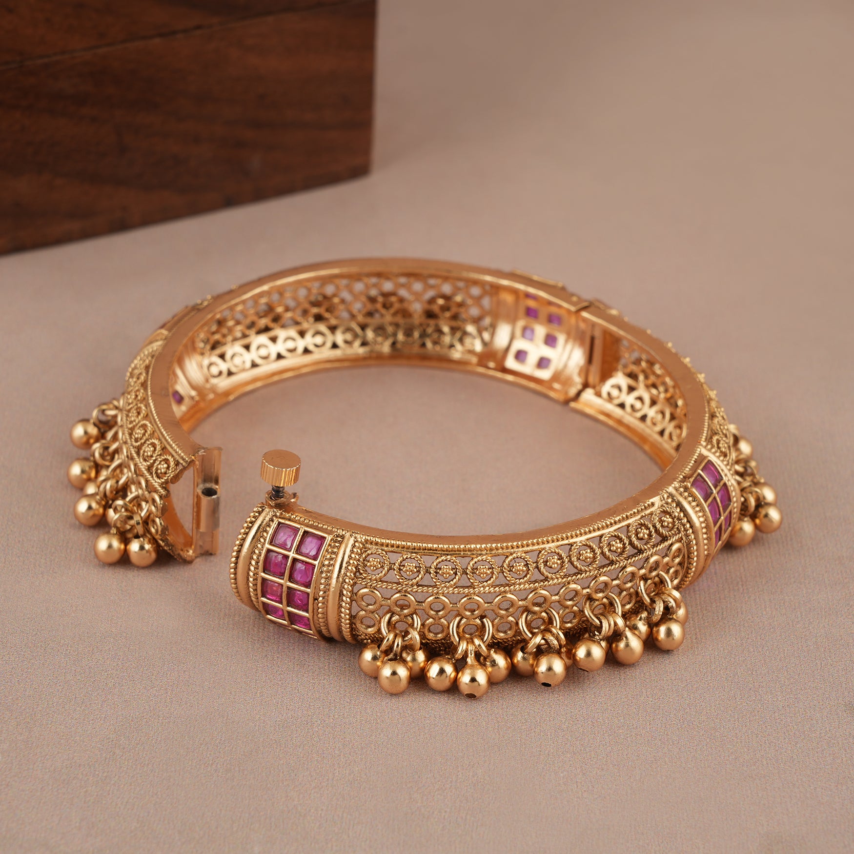 Broad antique gold ruby stone kada bangle