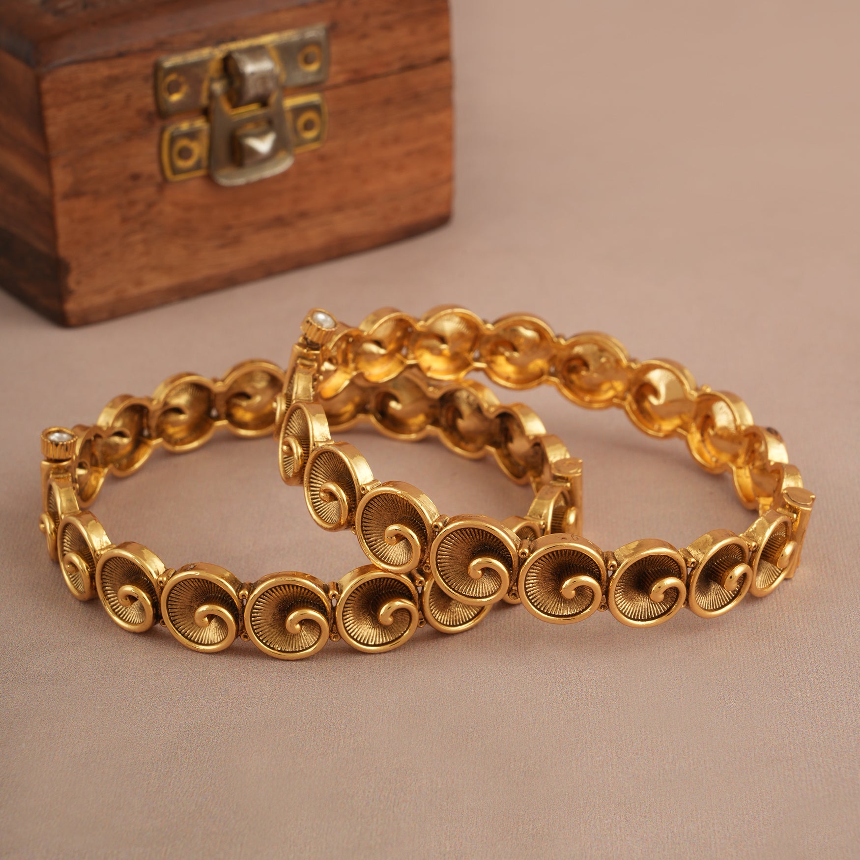 Stunning spiral antique gold bangle set