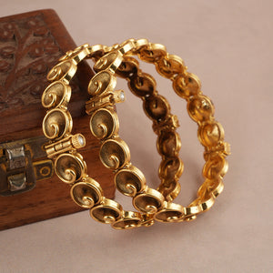 Stunning spiral antique gold bangle set