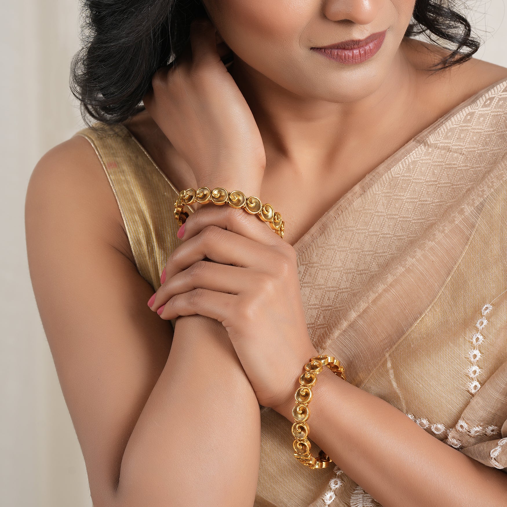 Stunning spiral antique gold bangle set