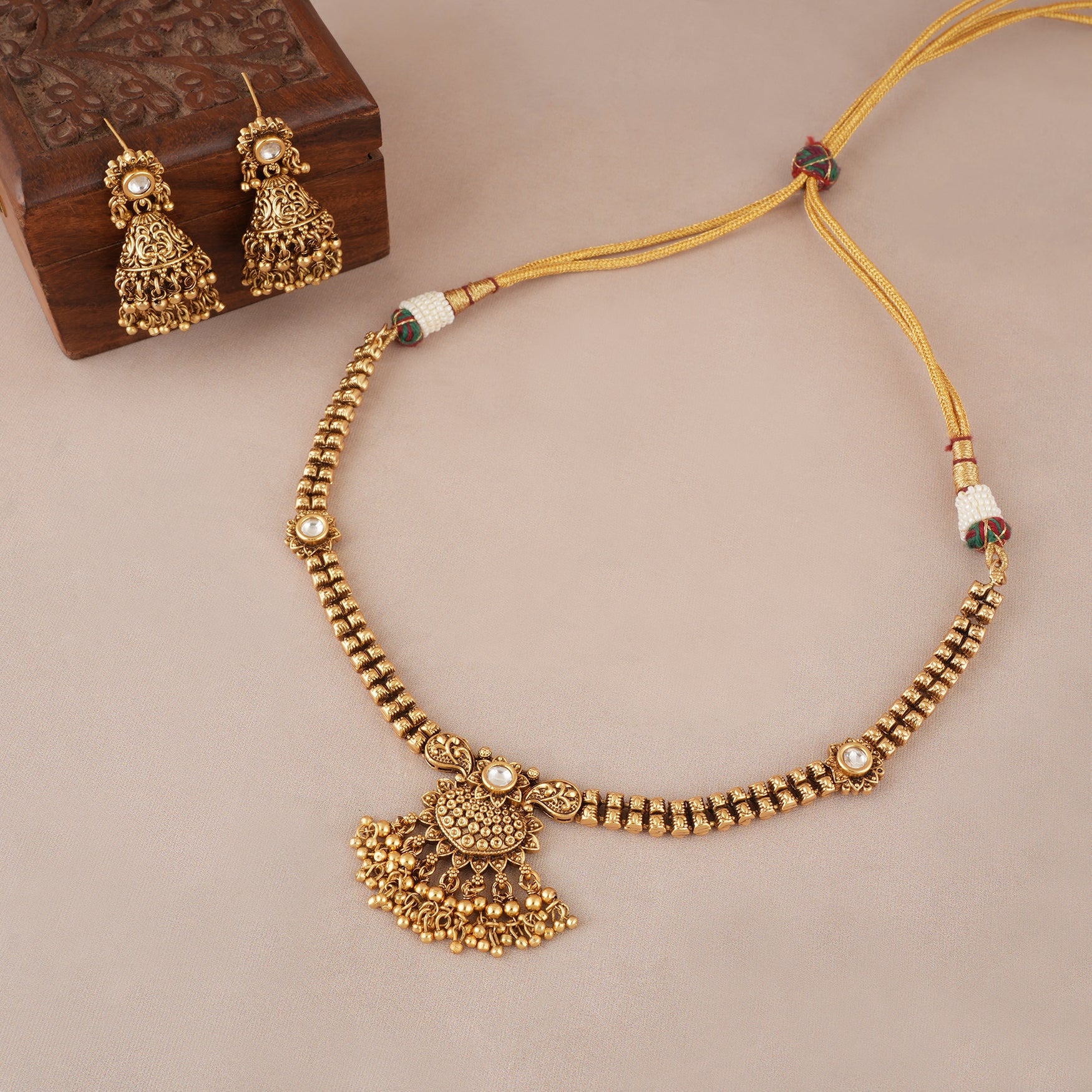 Elegant antique gold choker set with jhumka earring