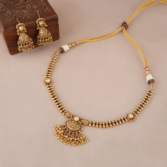 Elegant antique gold choker set with jhumka earring