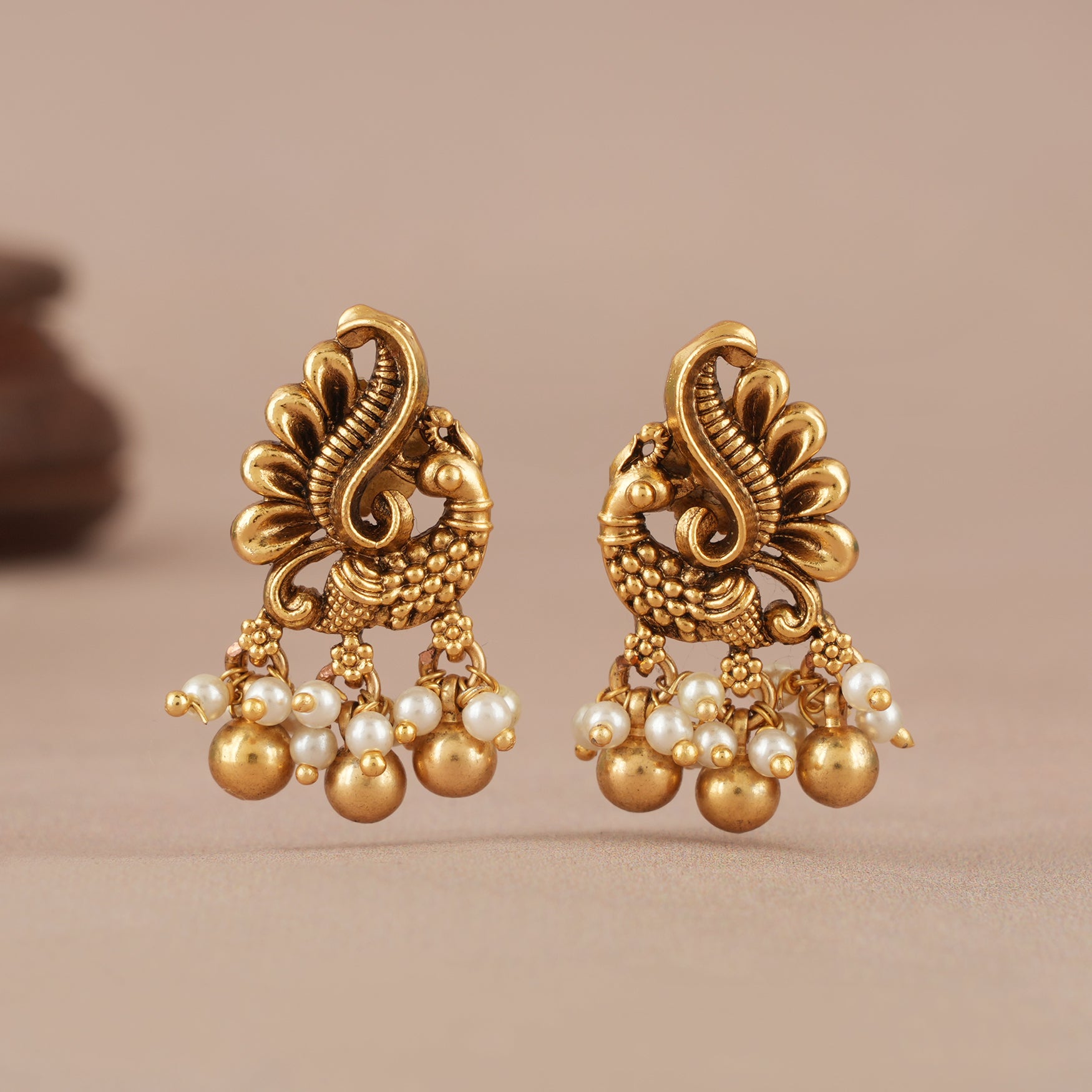 Pearl drop antique gold peacock earring