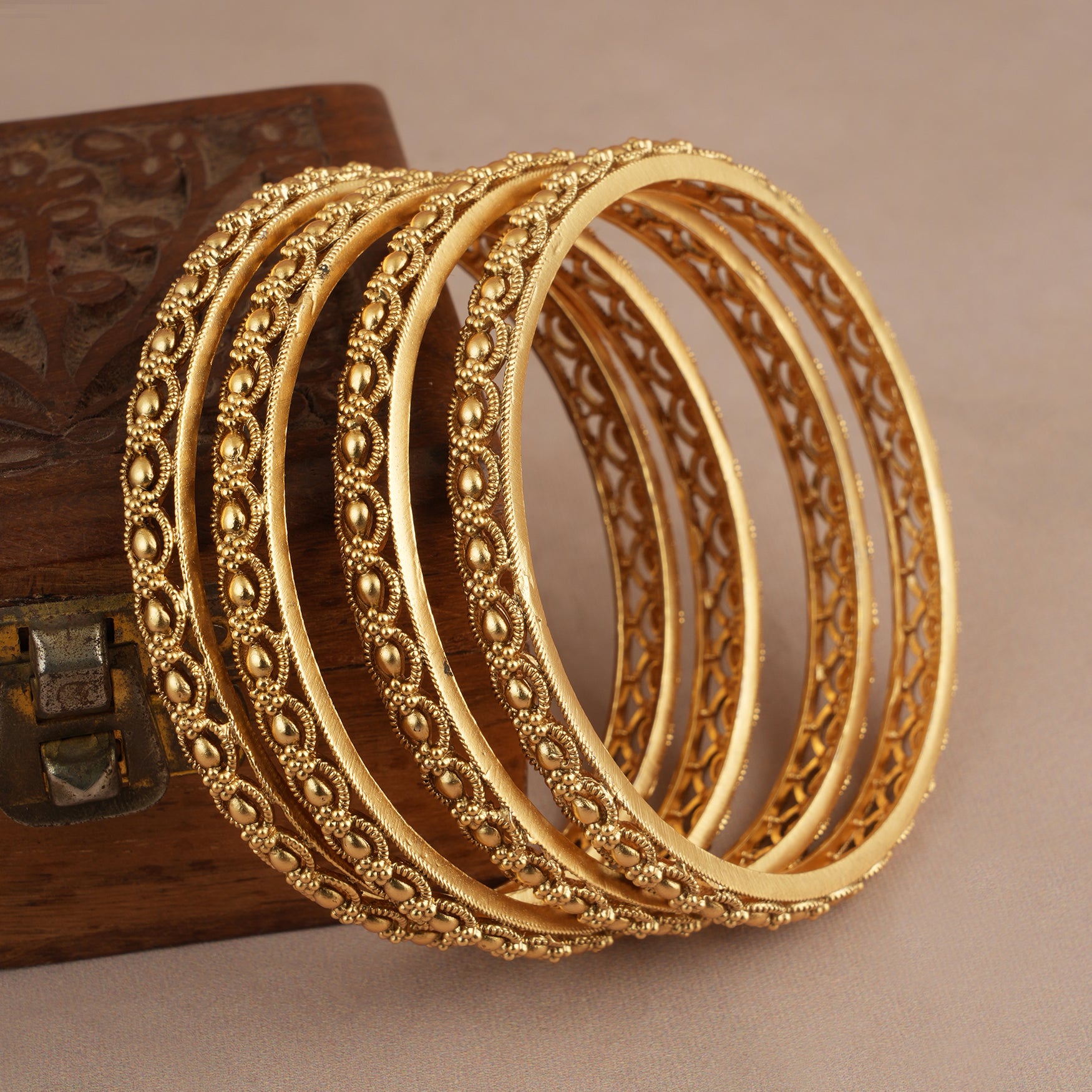 Stunning plain antique gold bangle set ( set of 4 )
