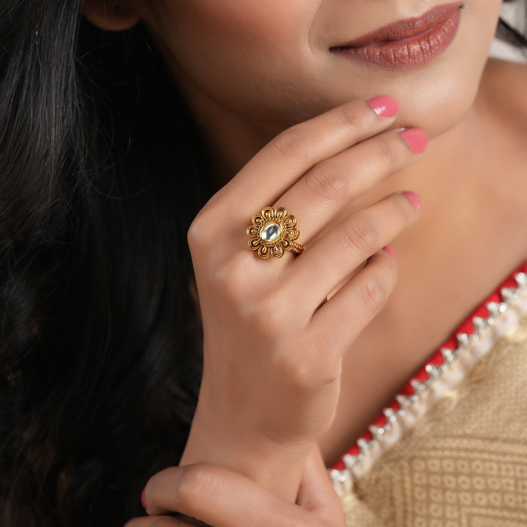 Cute oval floral kundan gold ring