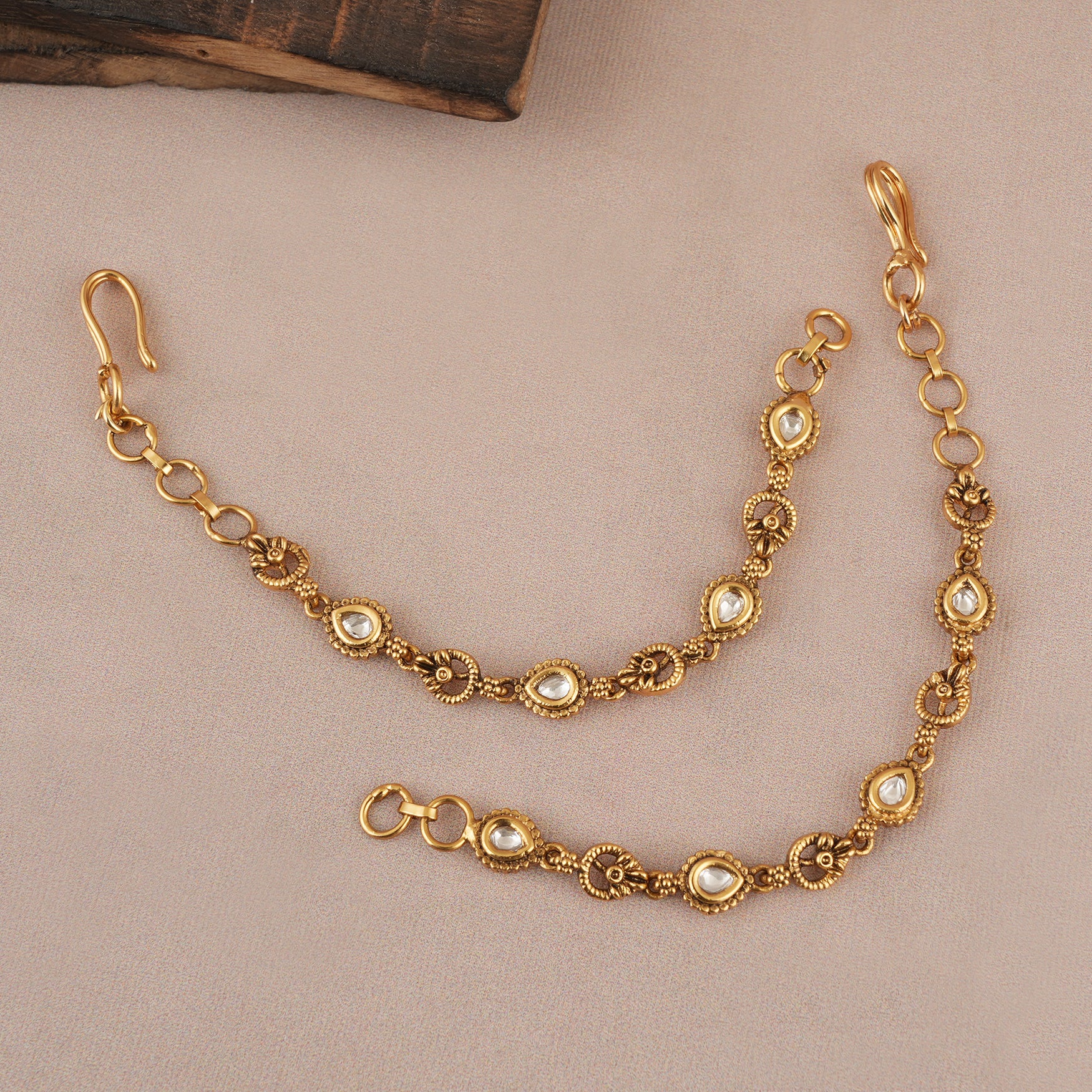Sleek antique gold kundan ear chain