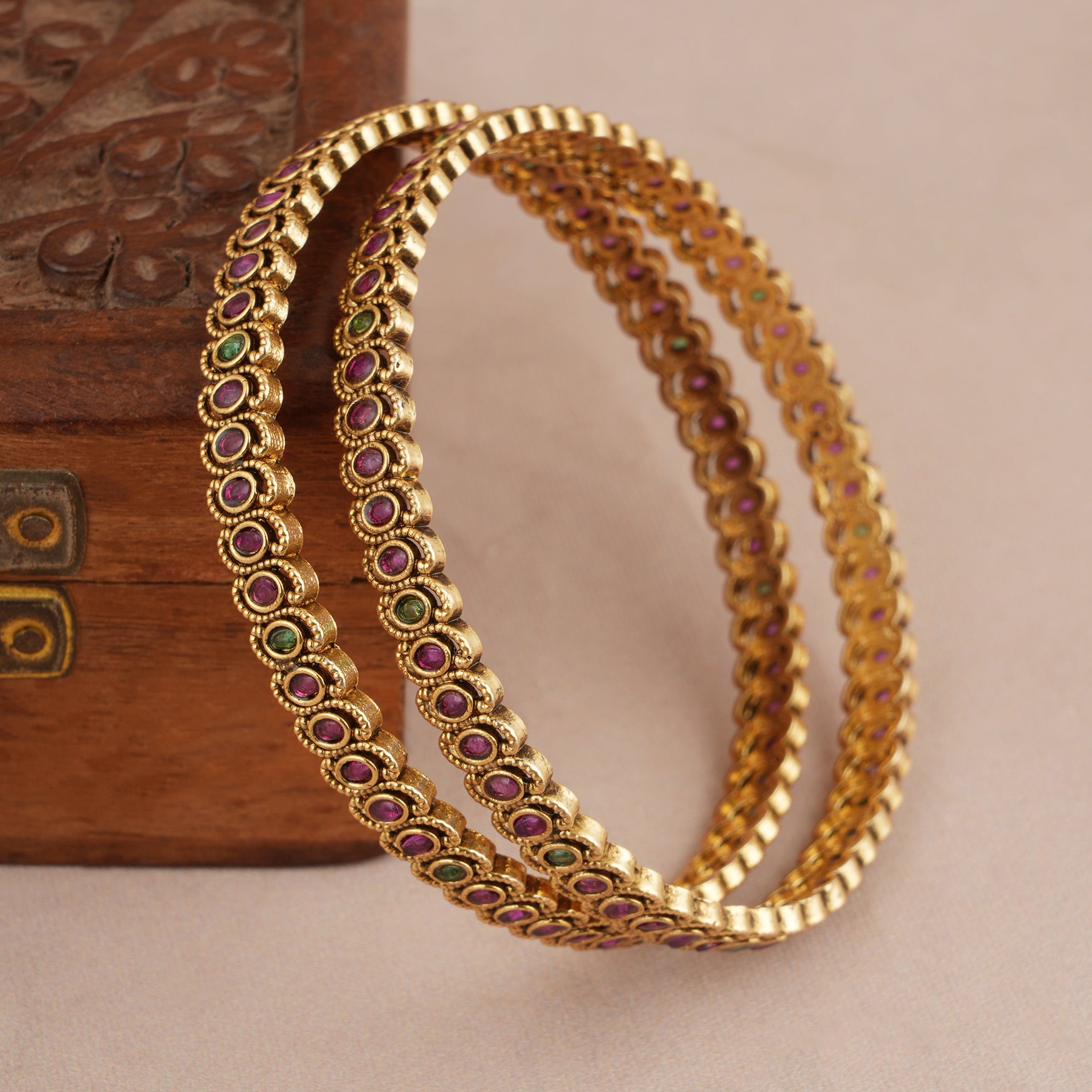 Sleek elegant multicolor antique gold bangle set
