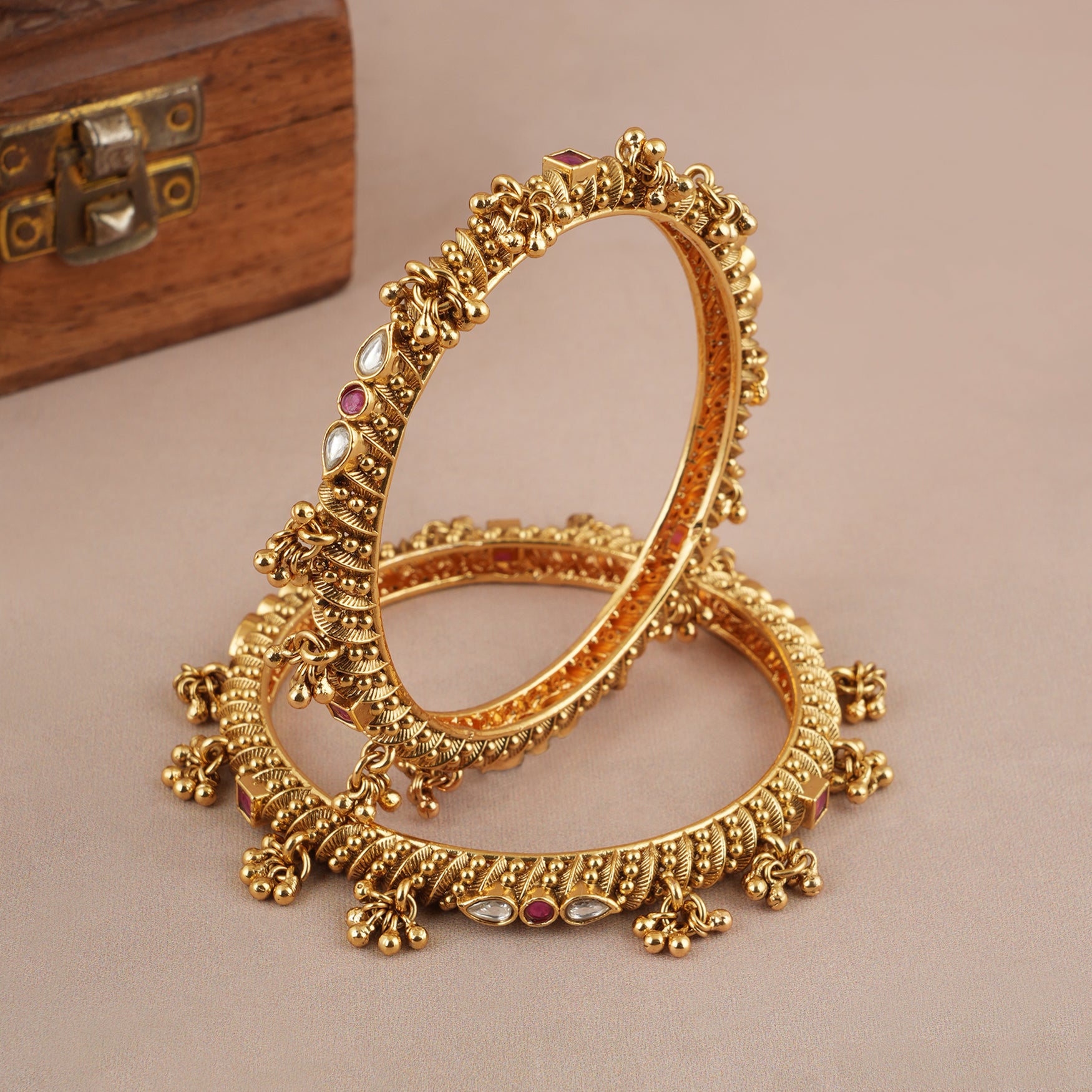 Amazing stone kundan gold ghungroo bangle set