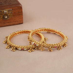 Amazing stone kundan gold ghungroo bangle set
