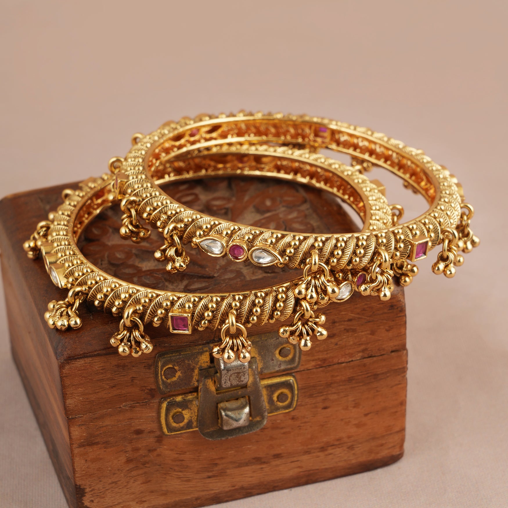Amazing stone kundan gold ghungroo bangle set