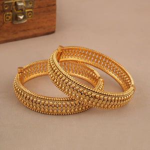 Broad gold plated bangle set