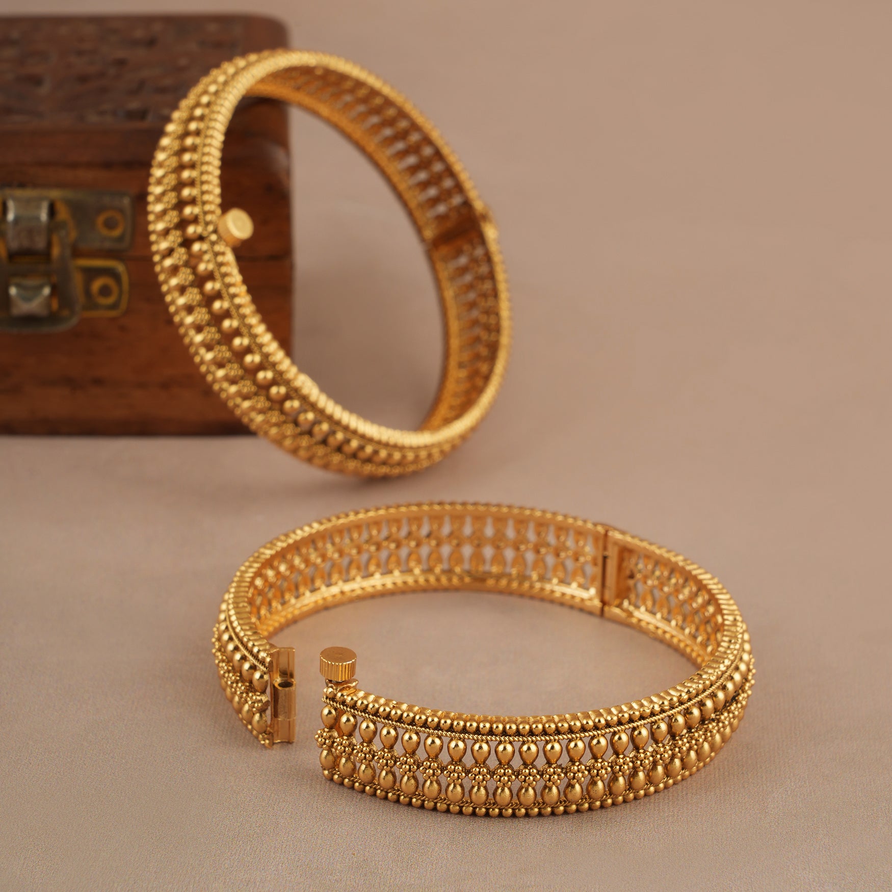 Broad gold plated bangle set