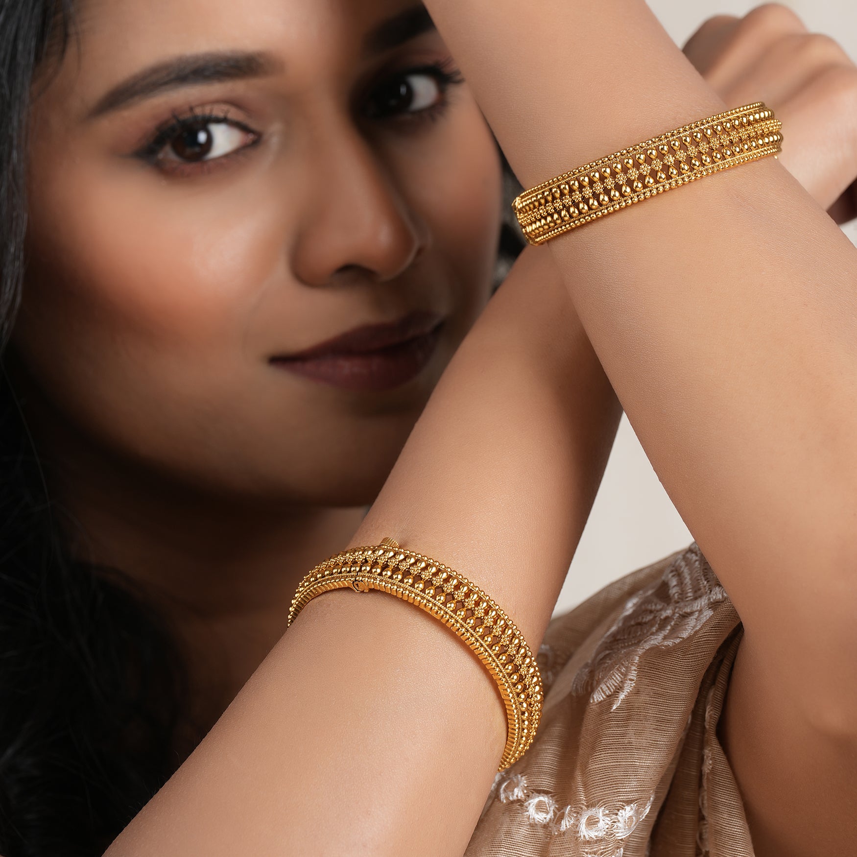 Broad gold plated bangle set