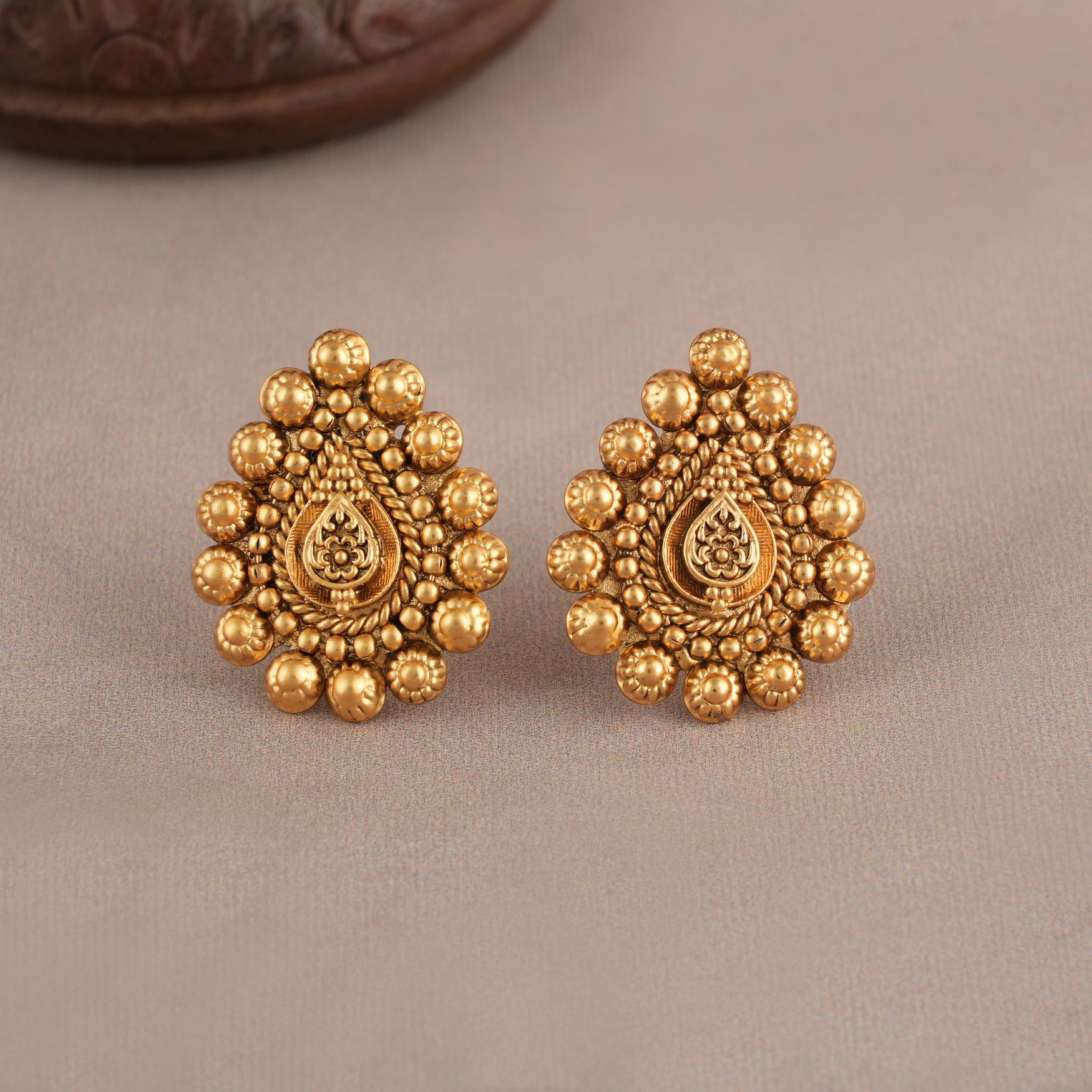 Stunning antique gold pear shape stud