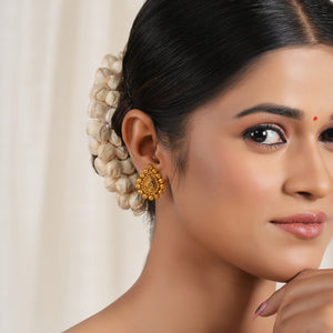 Stunning antique gold pear shape stud