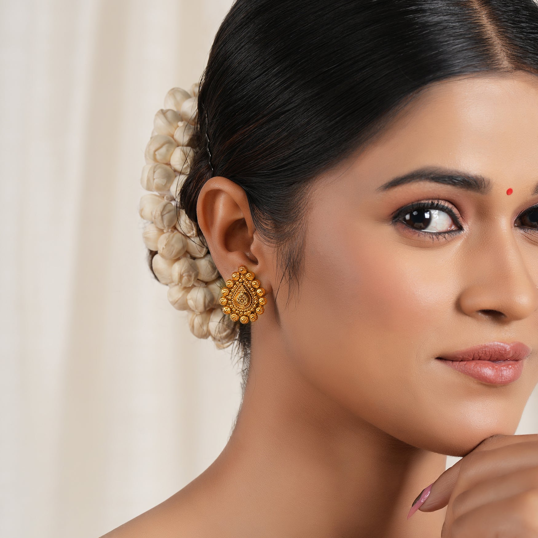 Stunning antique gold pear shape stud