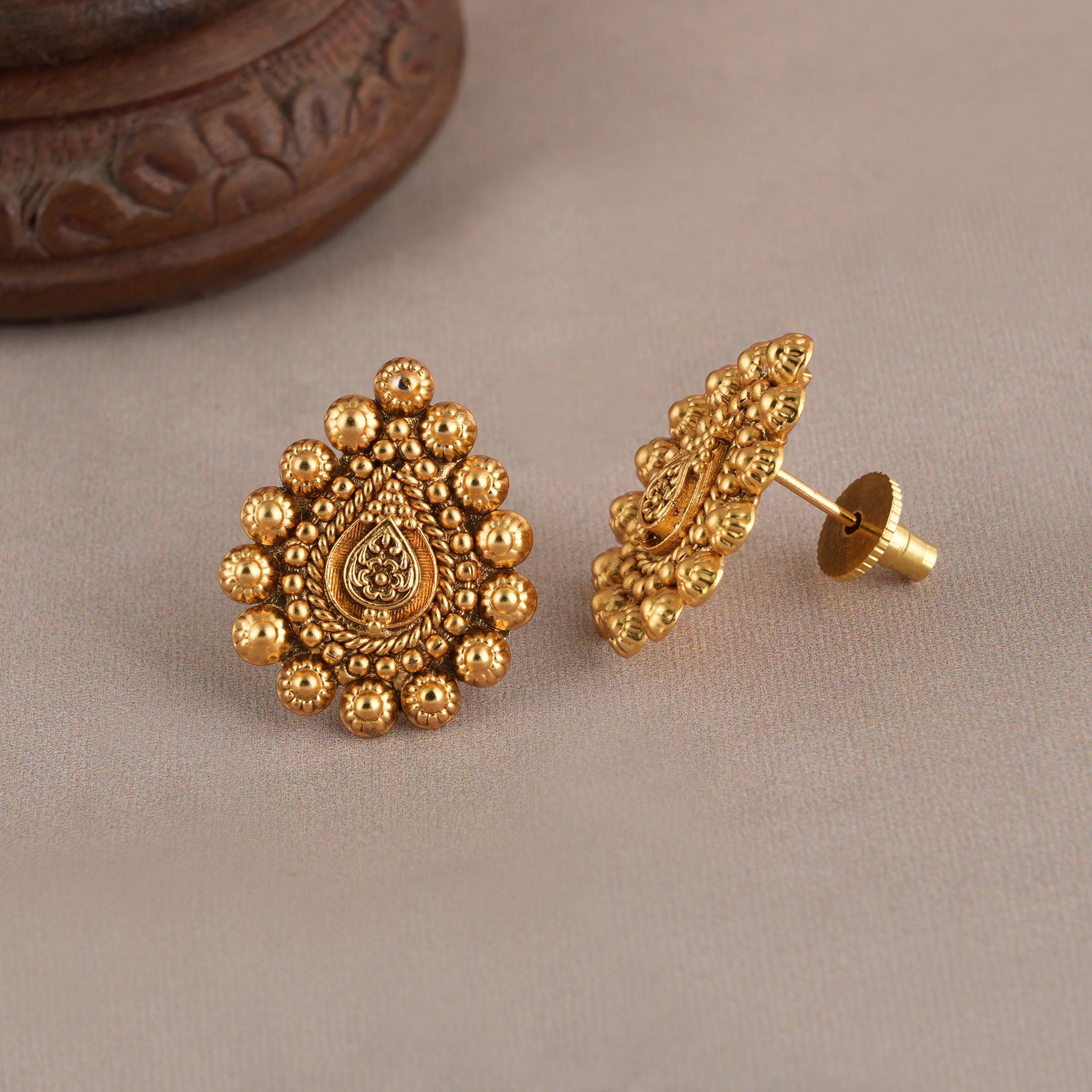 Stunning antique gold pear shape stud