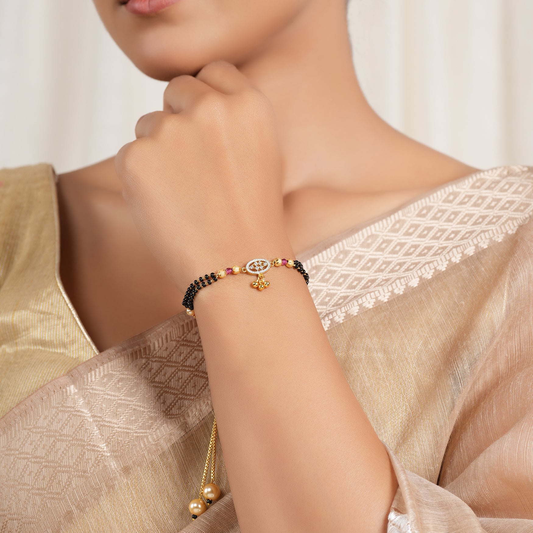 Cute gold polish mangalsutra bracelet