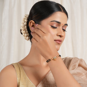 Gold plated free size stone bracelet