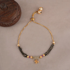 Gold plated free size stone bracelet