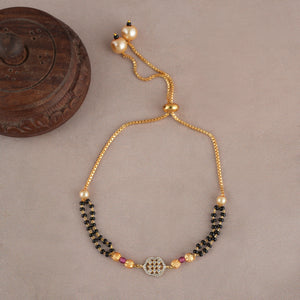 Sleek gold plated free size mangalsutra bracelet