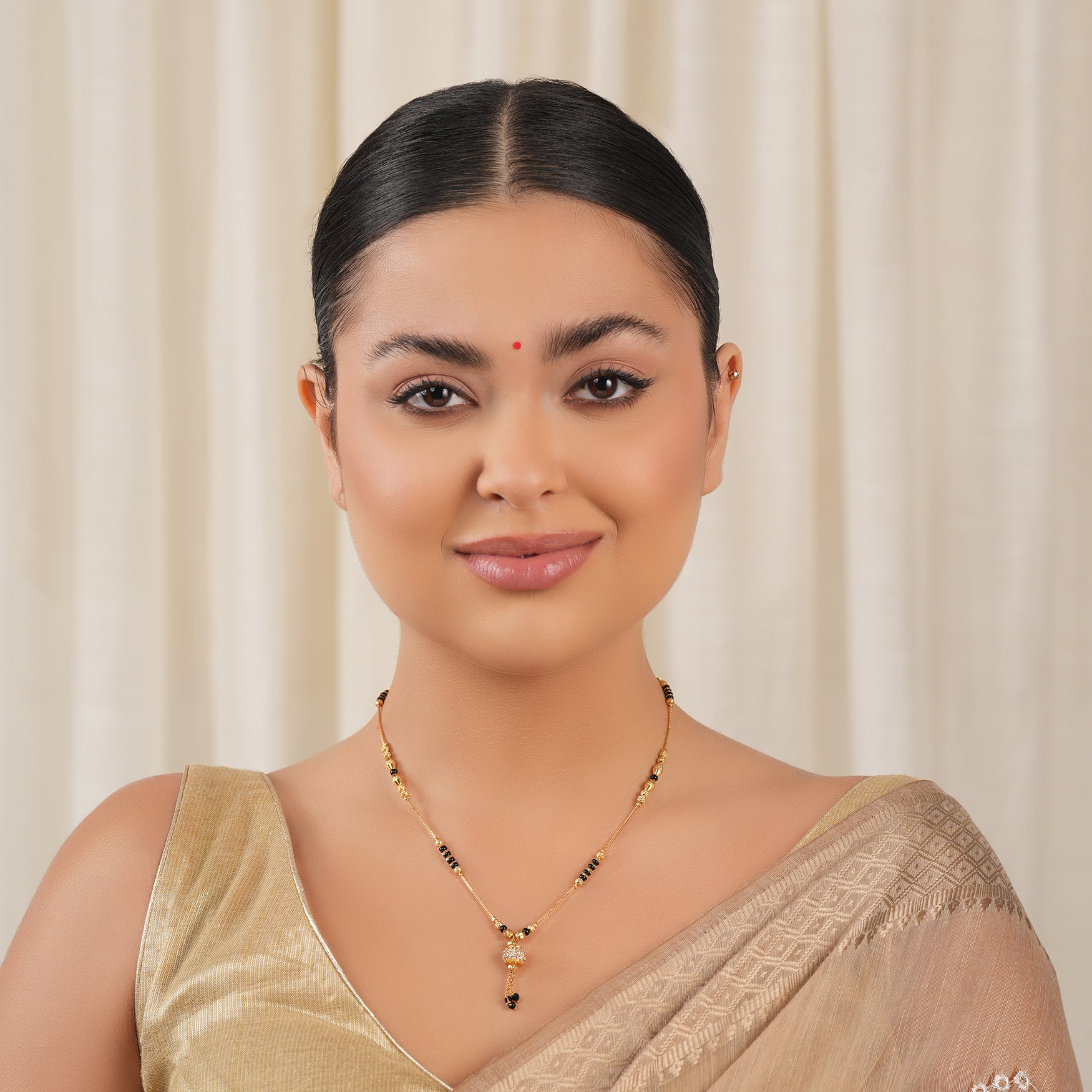 Sleek gold plated diamond ball mangalsutra