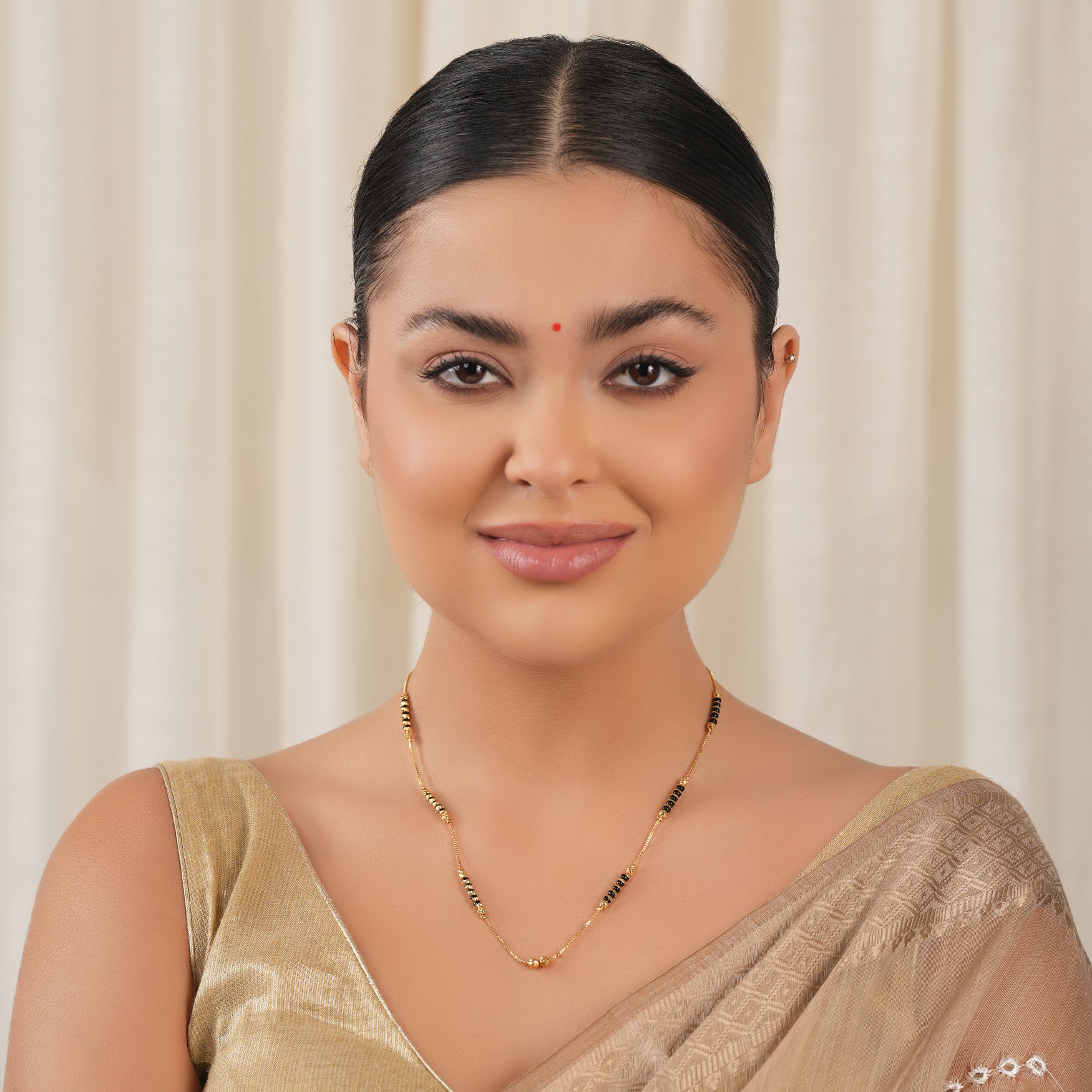 elegant gold plated black bead mangalsutra