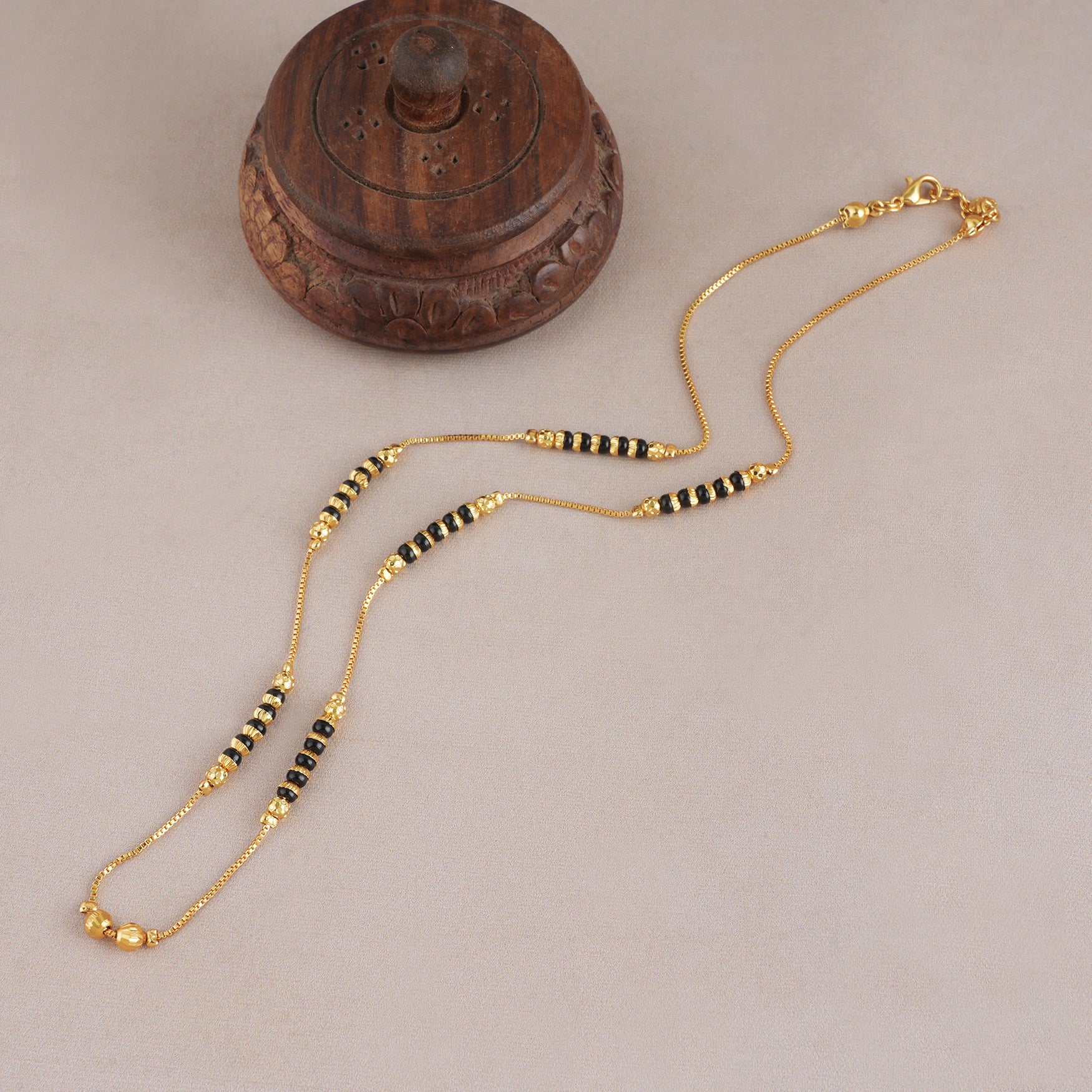 elegant gold plated black bead mangalsutra